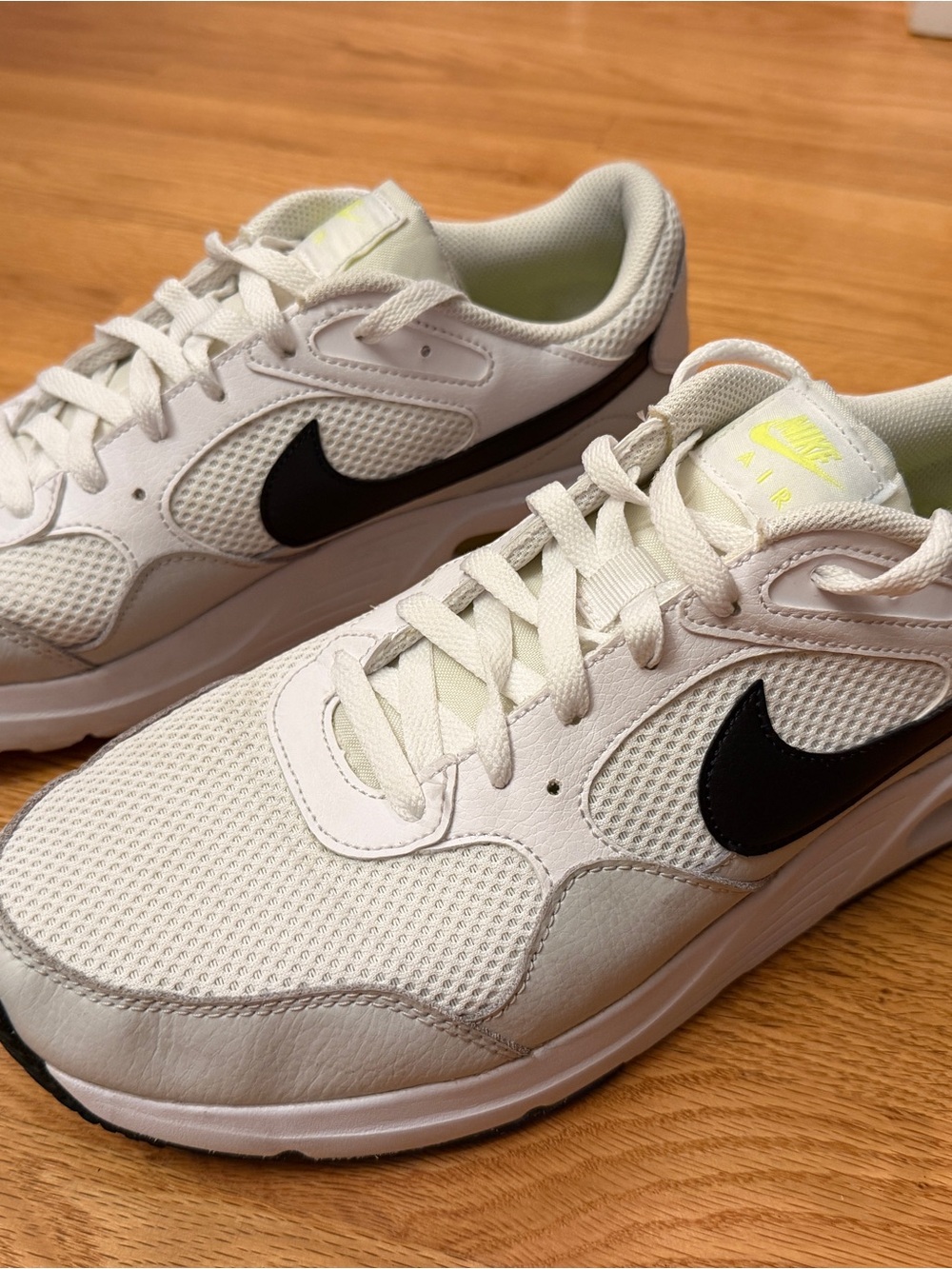 Nike Men's White Sneakers with Black Swoosh and Neon Yellow Accents
